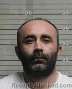 Mugshot of TOLMAS KHOLBEKOV booked in Butler County, Ohio on August 4, 2026