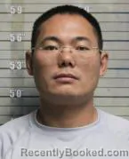 Mugshot of Liang Li booked in Butler County, Ohio on October 8, 2026
