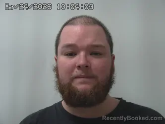 Mugshot of NATHAN BUTTS booked in Champaign County, Ohio on March 24, 2026