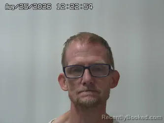 Mugshot of Joshua Bilunka booked in Champaign County, Ohio on August 25, 2026