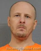 Mugshot of JUSTIN LEIGH SCHNEIDER
