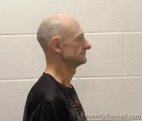 Mugshot of CHRISTOPHER LEE TIMMONS booked in Coshocton County, Ohio on March 18, 2026