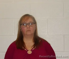 Mugshot of GENEA LYNN AIKENS booked in Coshocton County, Ohio on May 19, 2026