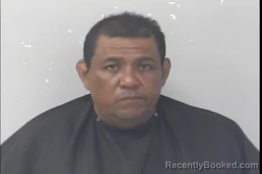 Mugshot of Lorwin Geneys Flores Correa booked in St Lucie County, Florida on August 22, 2026