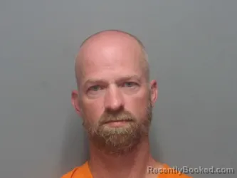 Mugshot of JUSTIN BENNETT booked in Cuyahoga County, Ohio on July 14, 2026