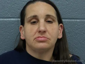 Mugshot of KRISTIN MOORE-BENNETT booked in Cuyahoga County, Ohio on May 13, 2026