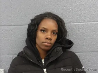 Mugshot of LACYNTHIA TIDMORE booked in Cuyahoga County, Ohio on March 18, 2026