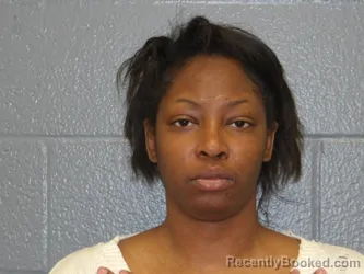 Mugshot of APRIL DAVIS booked in Cuyahoga County, Ohio on March 24, 2026