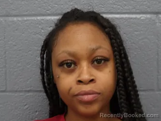 Mugshot of RONISHA SHAW booked in Cuyahoga County, Ohio on March 27, 2026