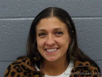 Mugshot of ASHLEY DEMONIA booked in Cuyahoga County, Ohio on March 27, 2026