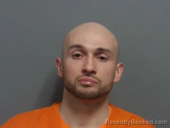 Mugshot of LANNING KUSTRA booked in Cuyahoga County, Ohio on March 24, 2026