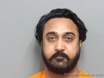 Mugshot of NAVJOT VIRK booked in Cuyahoga County, Ohio on March 25, 2026