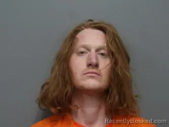 Mugshot of JACOB MOORE booked in Cuyahoga County, Ohio on March 25, 2026