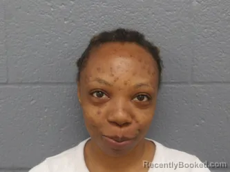 Mugshot of RAYNA ROBINSON booked in Cuyahoga County, Ohio on May 25, 2026