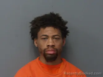 Mugshot of Malik Woody booked in Cuyahoga County, Ohio on August 26, 2026