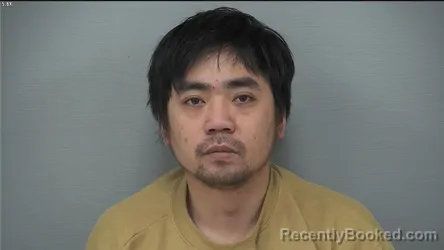 Mugshot of XINGQIANG CHEN booked in Delaware County, Ohio on March 31, 2026