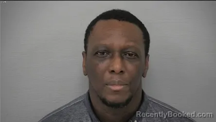 Mugshot of ADJE JEAN YVES MENSAH booked in Delaware County, Ohio on April 1, 2026