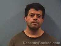 Mugshot of Adrian Recker booked in Erie County, Ohio on May 14, 2026