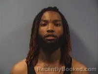 Mugshot of Carlos Garrett booked in Erie County, Ohio on October 9, 2026
