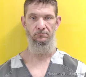 Mugshot of JASON DAVID SHUMAKER