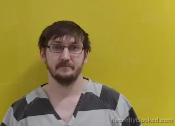 Mugshot of TRAVIS LEE BAUMGARDT