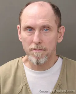 Mugshot of JOHN ERVIN NICHOLS