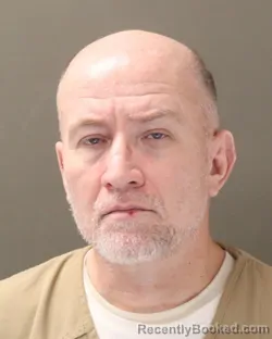 Mugshot of MICHAEL J RIGGLE