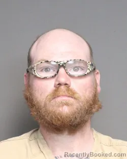 Mugshot of JONATHAN J SLATES booked in Franklin County, Ohio on May 13, 2026