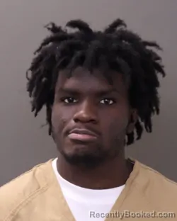 Mugshot of Yan Eloi Bassouamina Kouekassazo