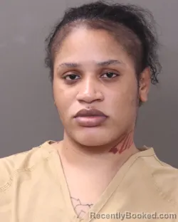 Mugshot of HENRICIA OKOMBI booked in Franklin County, Ohio on March 18, 2026