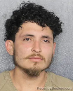 Mugshot of CARLOS ERNESTO FLORES MOLINA booked in Broward County, Florida on May 2, 2026