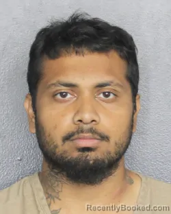 Mugshot of RISHAAD IBN AGBAR KHAN booked in Broward County, Florida on May 13, 2026