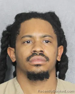 Mugshot of HENOC FLOVELLA booked in Broward County, Florida on March 11, 2026