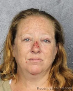 Mugshot of AIMEE ELIZABETH CARLAND booked in Broward County, Florida on May 11, 2026