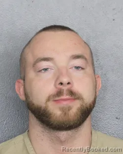 Mugshot of TOMASZ ADAMCZUK