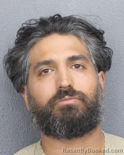 Mugshot of CHRISTOPHER THOMAS VICTOR FOSKARIS CALDERA booked in Broward County, Florida on March 12, 2026