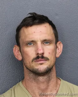 Mugshot of BRANDON ALEXANDER MOLINET booked in Broward County, Florida on June 26, 2026