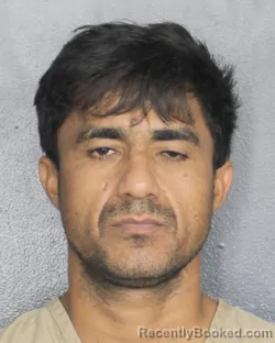 Mugshot of CARLOS HASSAN REYES BATLLE booked in Broward County, Florida on April 27, 2026