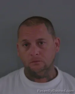 Mugshot of JASON HARLEY OLIVERA