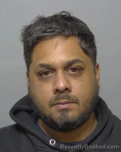Mugshot of DHANAN ALEXANDER GANPAT booked in Sumter County, Florida on July 18, 2026