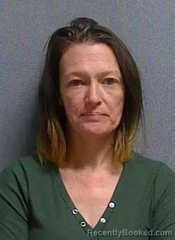 Mugshot of CHRISTINA MOORE booked in Geauga County, Ohio on April 2, 2026