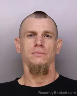 Mugshot of MICHAEL MOORE