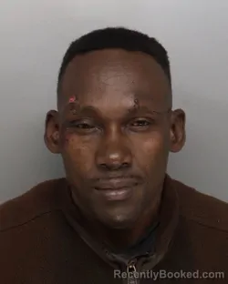 Mugshot of MUKABIZI MASUMBUKO booked in Hamilton County, Ohio on March 4, 2026