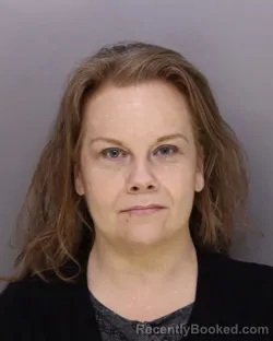 Mugshot of HOLLY SUMNER booked in Hamilton County, Ohio on March 13, 2026