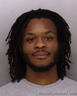 Mugshot of MWANGII OGOGUN booked in Hamilton County, Ohio on March 13, 2026