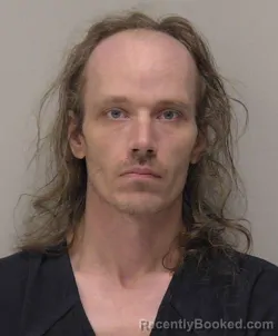 Mugshot of Jonathon Christopher Ridenour booked in Hancock County, Ohio on March 30, 2026