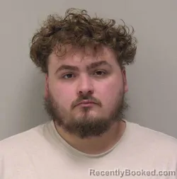 Mugshot of Christopher Michael Reed booked in Hancock County, Ohio on May 13, 2026