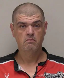 Mugshot of Christopher George Flores booked in Hancock County, Ohio on October 8, 2026
