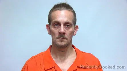 Mugshot of TRAVIS JOHN HEWETT booked in Suwannee County, Florida on May 8, 2026