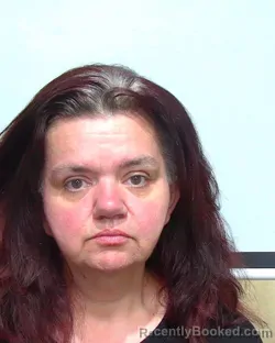 Mugshot of KELLY SUZANNE BURKETT booked in Suwannee County, Florida on May 10, 2026